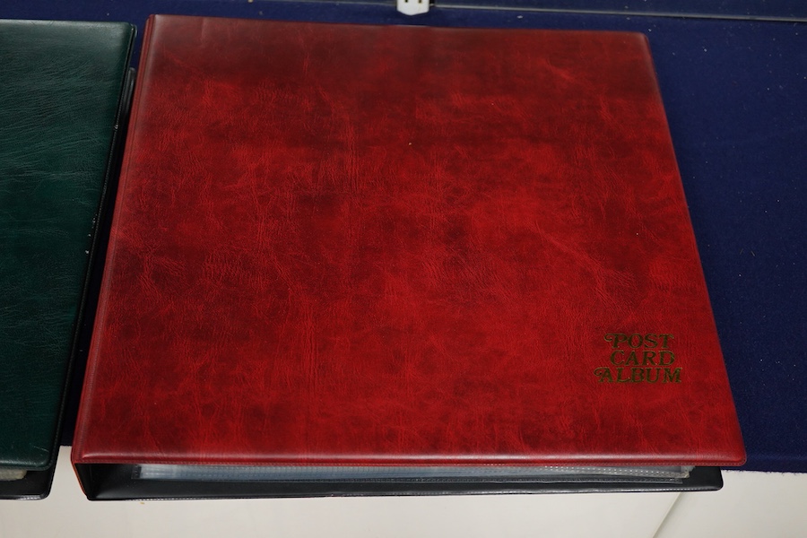 A collection of early 20th century railway related postcards, contained within two modern postcard albums, mainly pre-grouping railway companies including; the GWR, the LNWR, the Caledonian Railway, the Great North of Sc